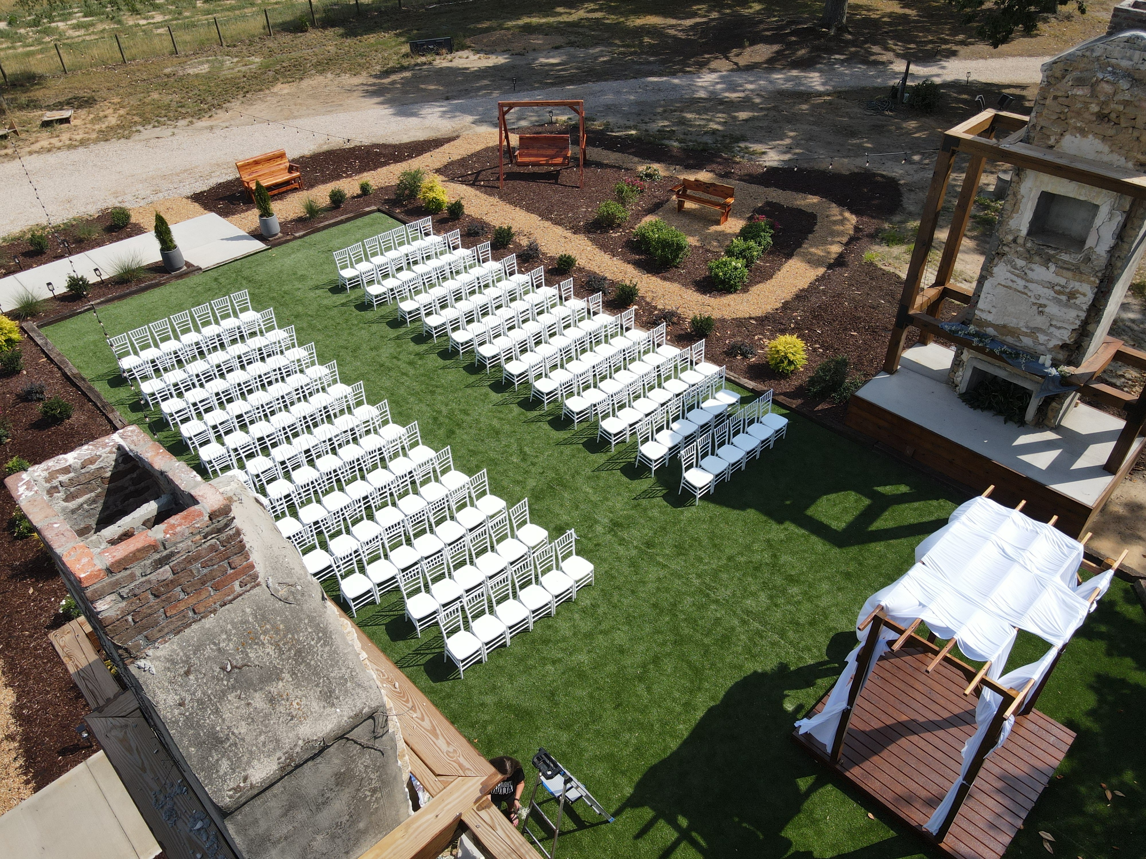 Aerial view of ceremony with chimneys